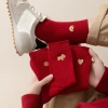Sock stall offers one-piece delivery service for men's zodiac year of the Horse red socks, cotton socks, big red socks, autumn and winter New Year socks, embroidered golden horse wedding dark red long socks details Picture